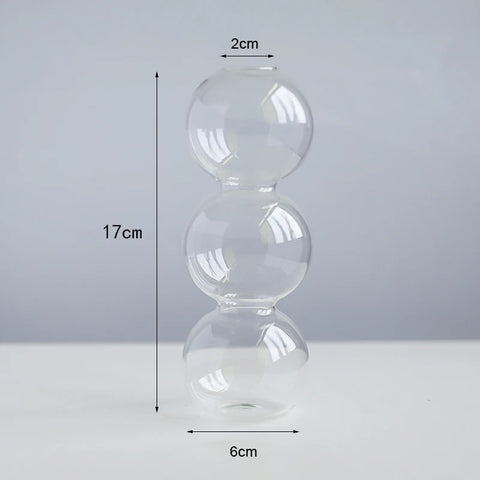 Roma Glass candlestick holder by Shop the Kei home treasure collection in clear. 3-stacked bubbles shape modern-style blown glass candlestick holder dimensions 2cm X 17cm X 6cm