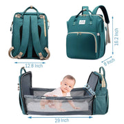 Green baby diaper backpack shown in multiple views: with dimensions 12.8 in wide by 8 in depth by 16.2 inch height. Bassinet extends 29 inches long by 12 inches depth. Lotus 3-in-1 bassinet diaper bag travel system with partial canopy