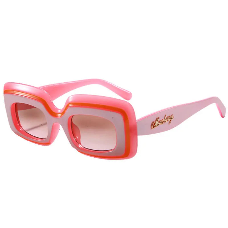 Rose Quartz Retro Shades sunglasses, a pink and coral frame with rose-tinted gradient lenses, shown at a three-quarter angle on a white background.