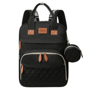 Black Lotus 3-in-1 Bassinet Diaper Bag backpack with orange leather accents, featuring quilted front pocket, dual carry handles, and small circular accessory pouch. Full canopy available