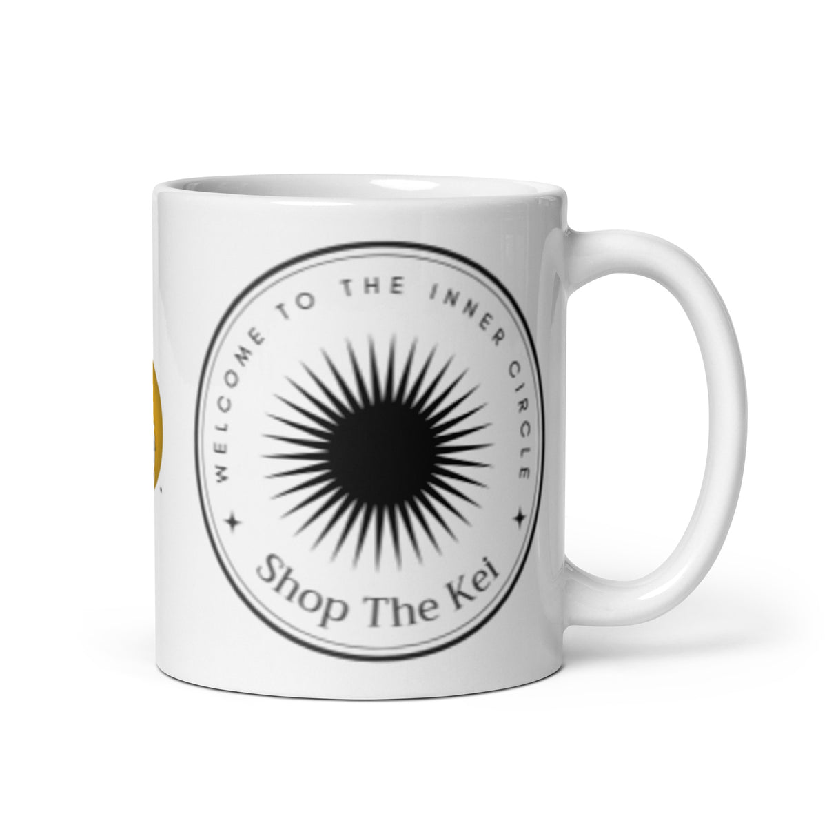 Inner Circle Mug with the handle on the right, showing the Welcome to the Inner Circle sunburst emblem